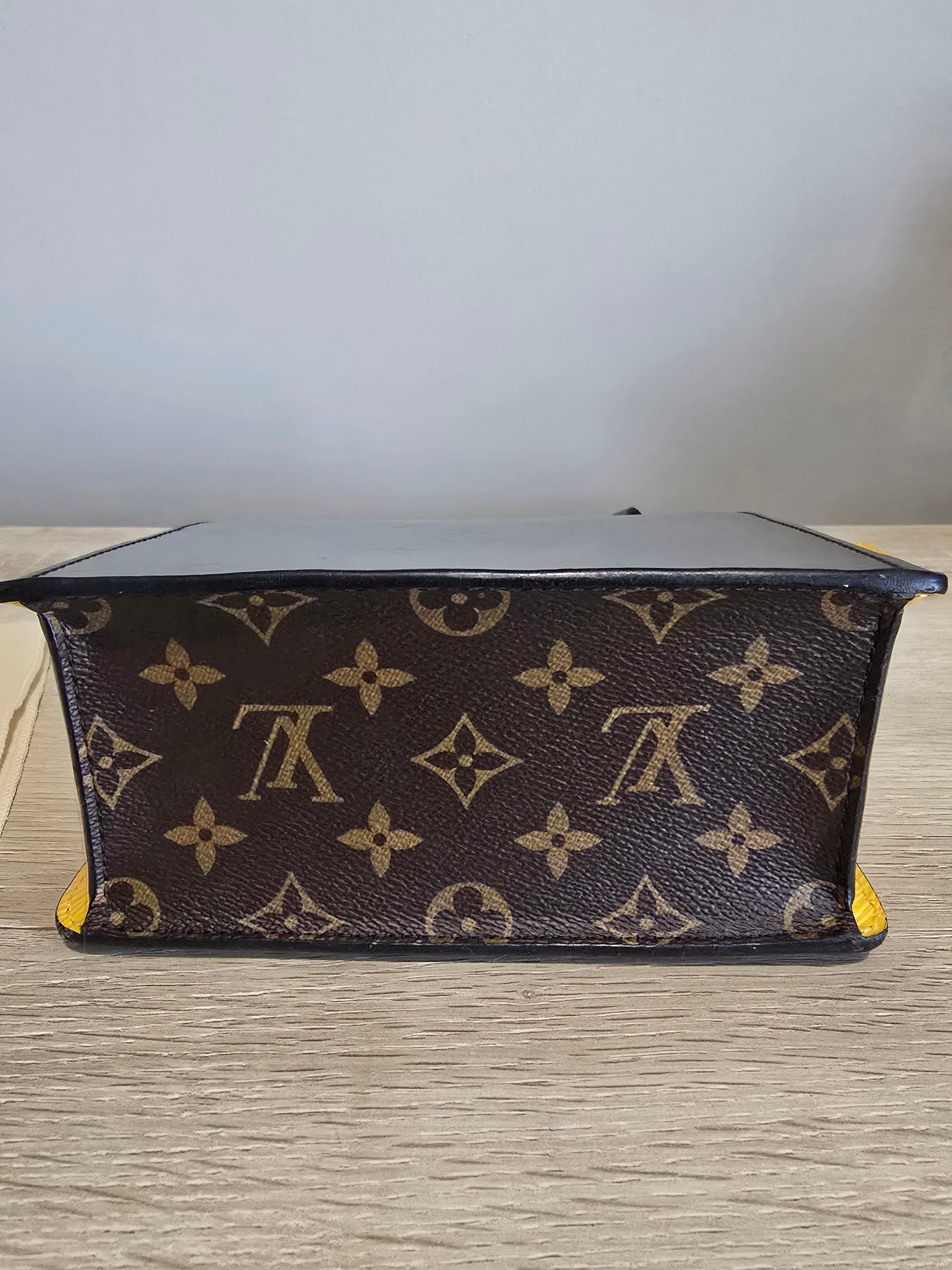 Louis Vuitton Spring Street Top Handle Bag — Silver