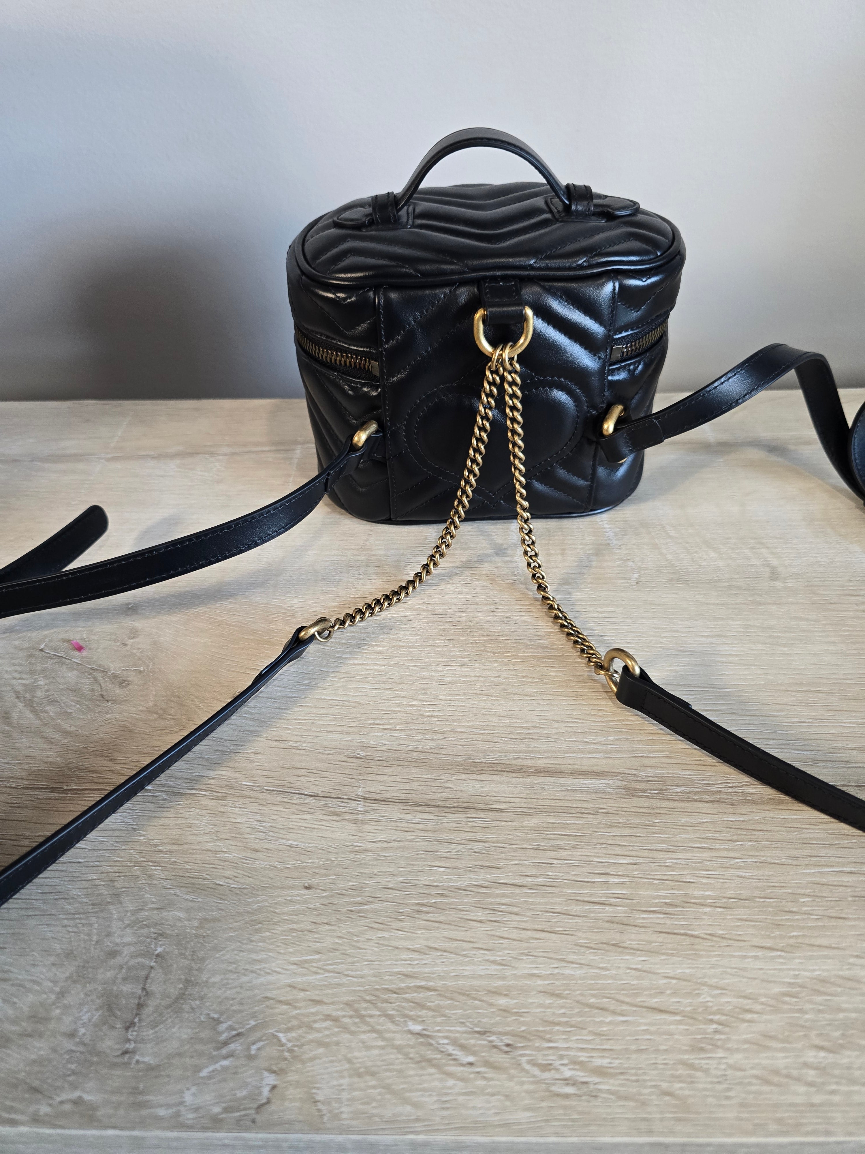 Gucci GG Marmont Mini Round Backpack Black Matelassé Leather Gold Hardware