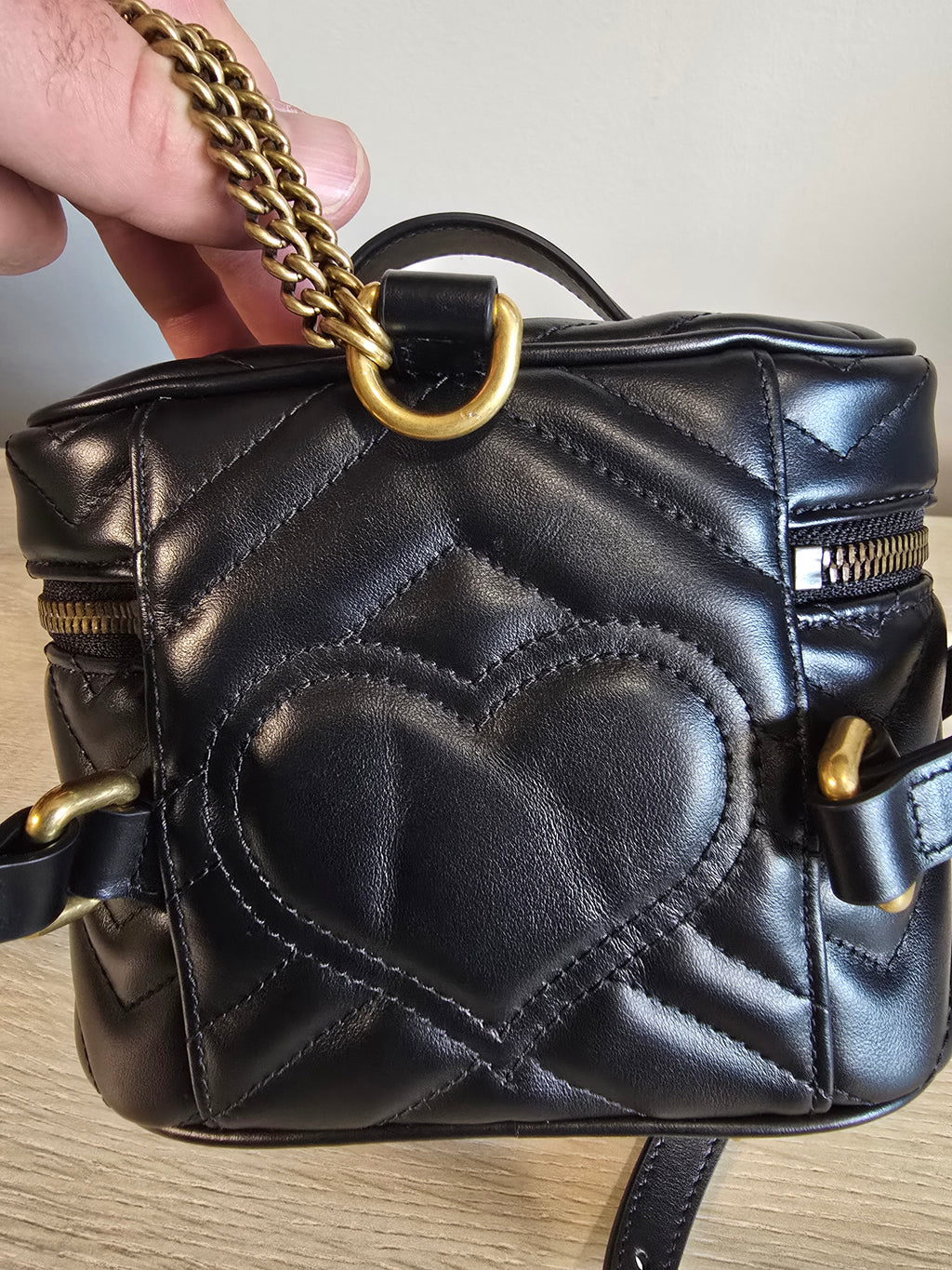 Gucci GG Marmont Mini Round Backpack Black Matelassé Leather Gold Hardware
