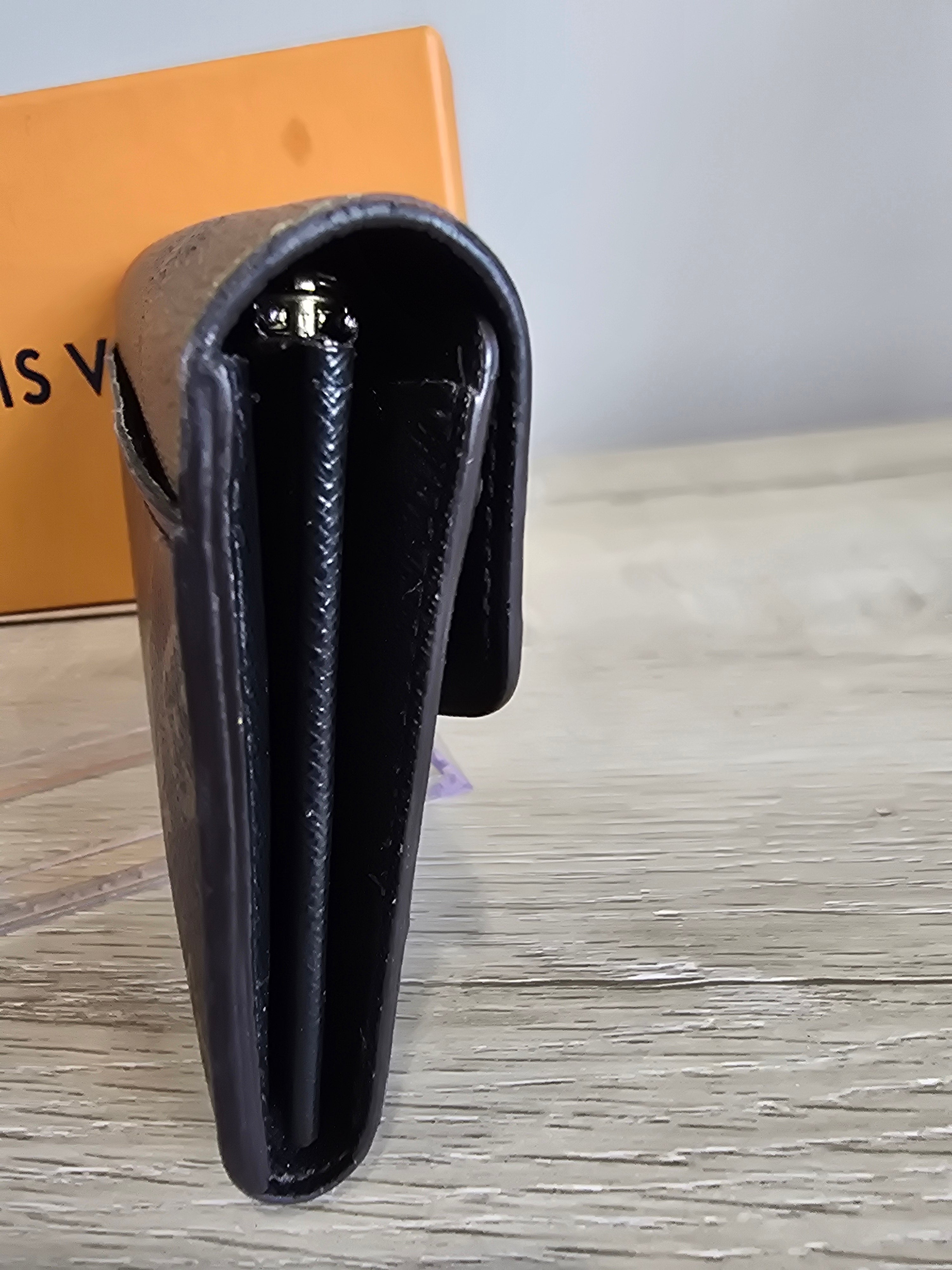 Louis Vuitton Reverse Monogram Giant Sarah Wallet